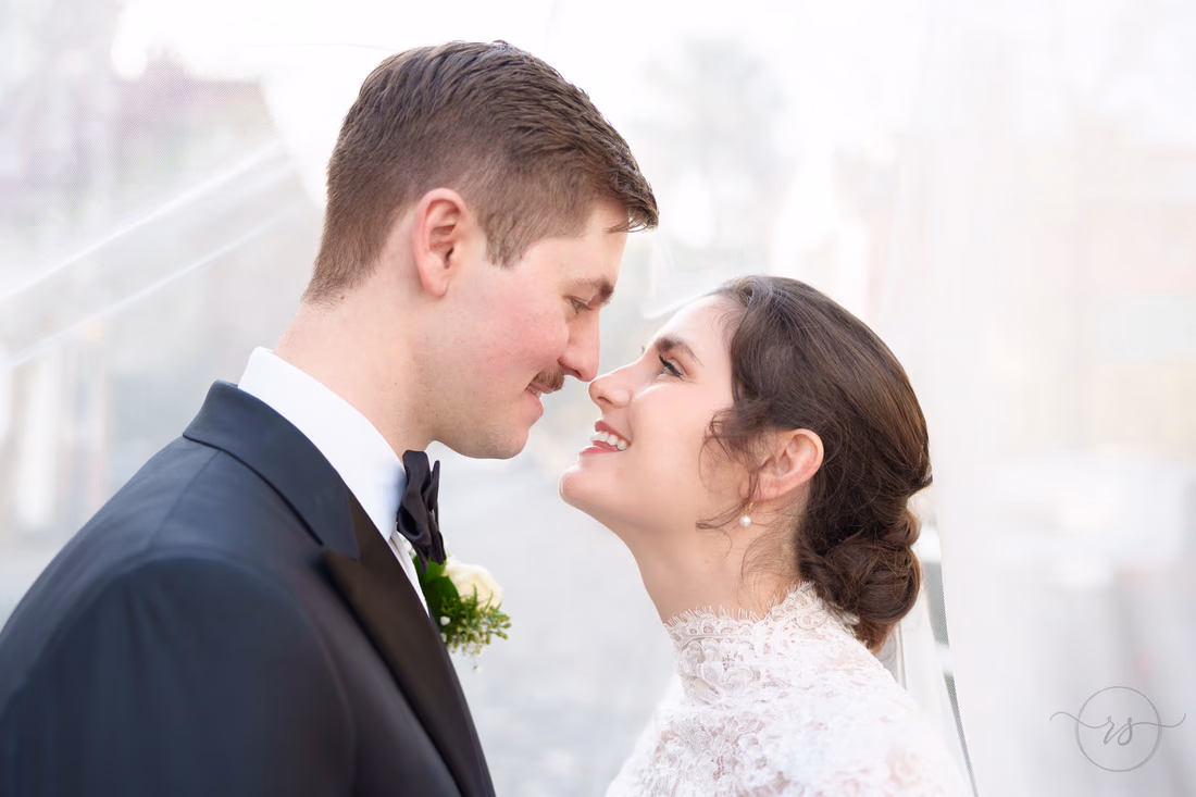Bride and groom touching noses under the veil - Chalmers Street