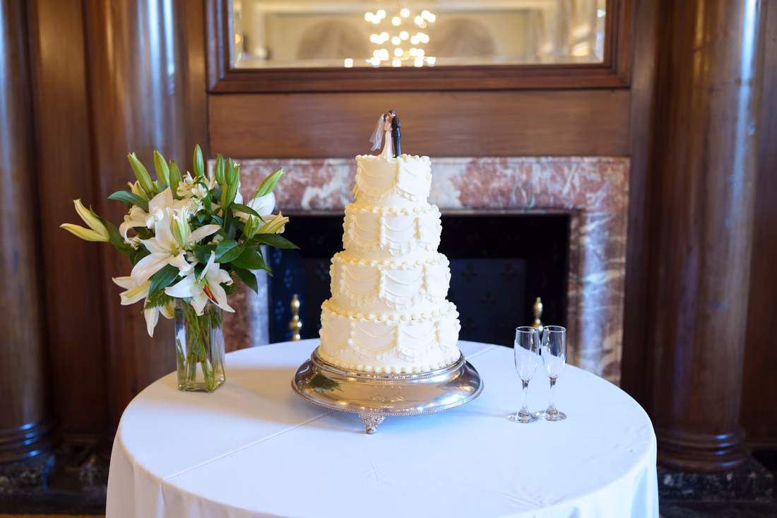 Wedding cake in front of the marble fireplace - Francis Marion Charleston