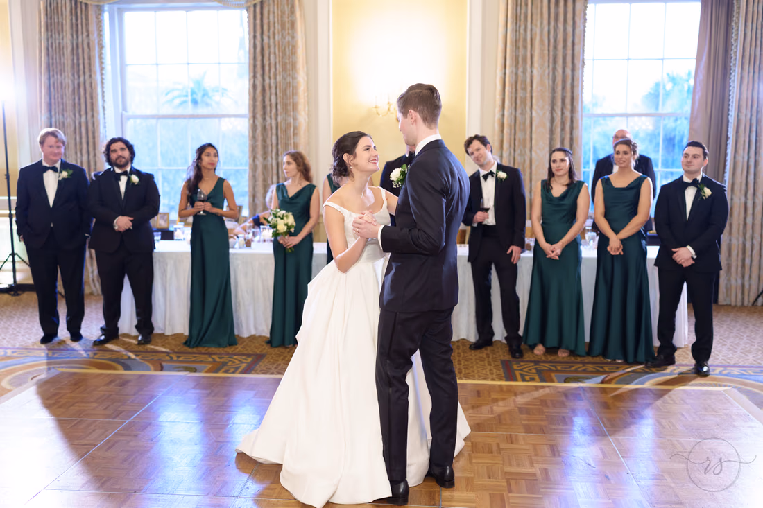 Bride and groom smiling at each other during the first dance - Francis Marion Charleston