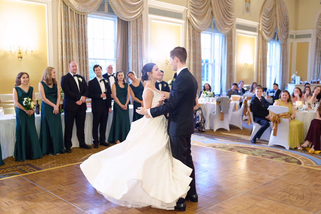 Bride's gown swirling as they dance in the ballroom - Francis Marion Charleston