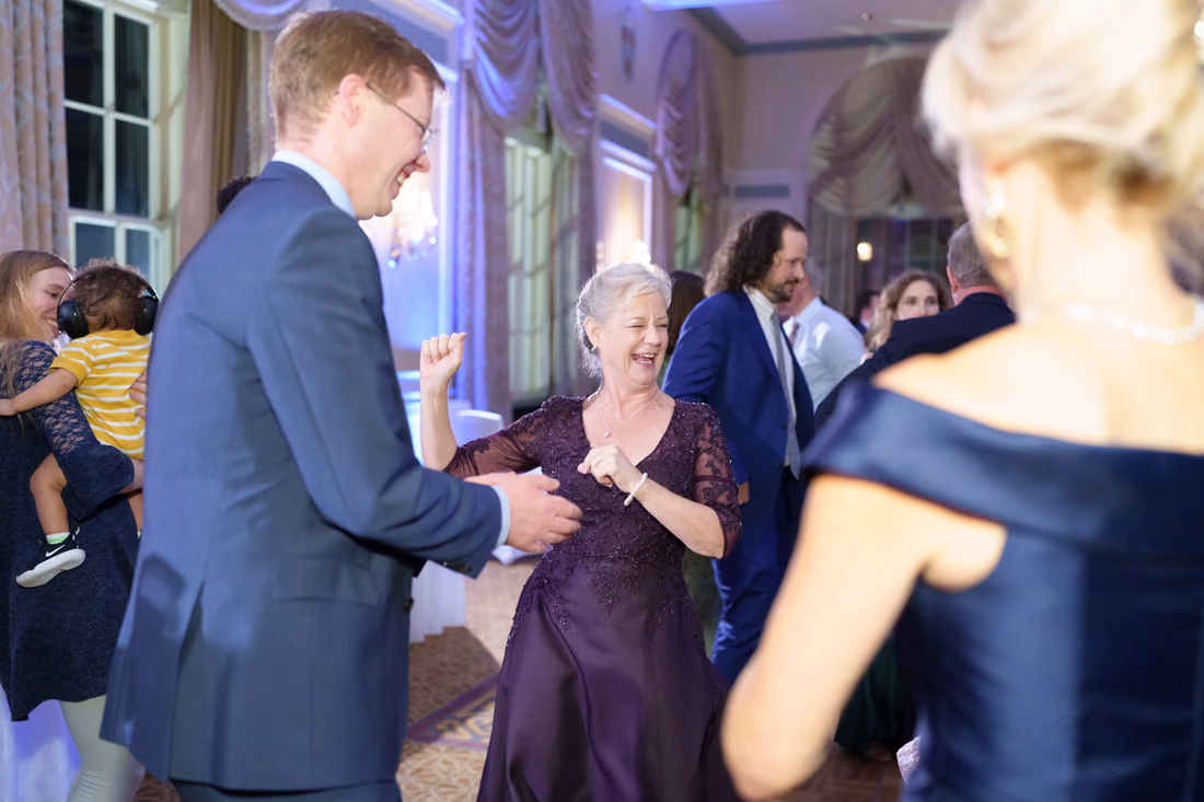 Guests laughing and dancing in the ballroom - Francis Marion Charleston