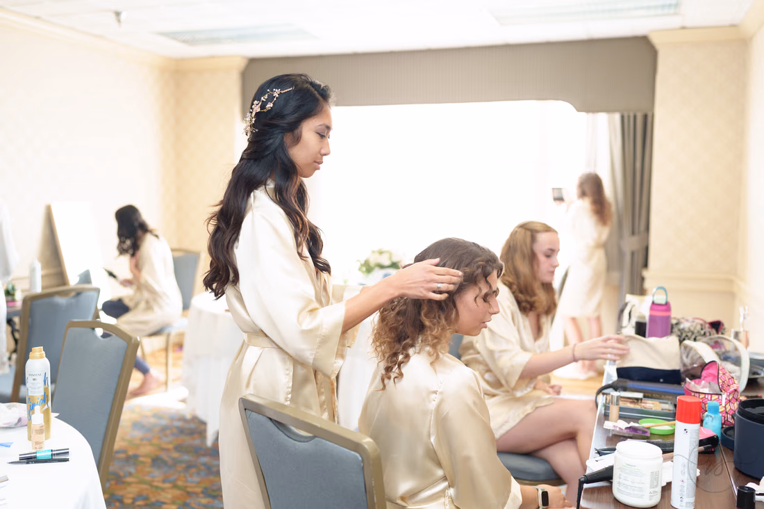 Bridesmaids getting their hair done before the wedding - Francis Marion Charleston