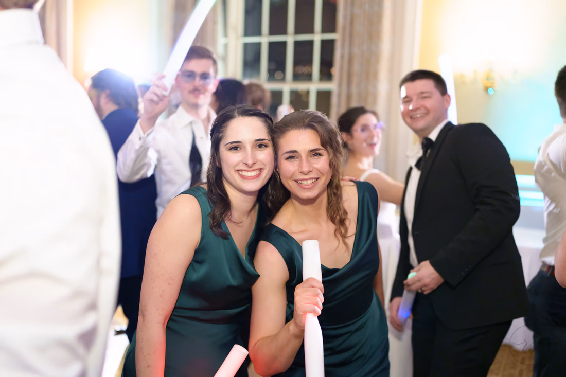 Bridesmaids posing with light sticks - Francis Marion Charleston