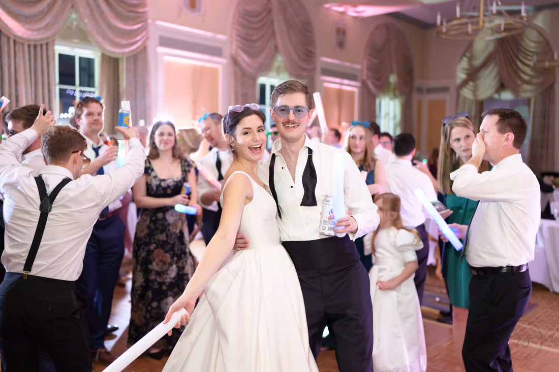Bride and friends dancing with light sticks - Francis Marion Charleston