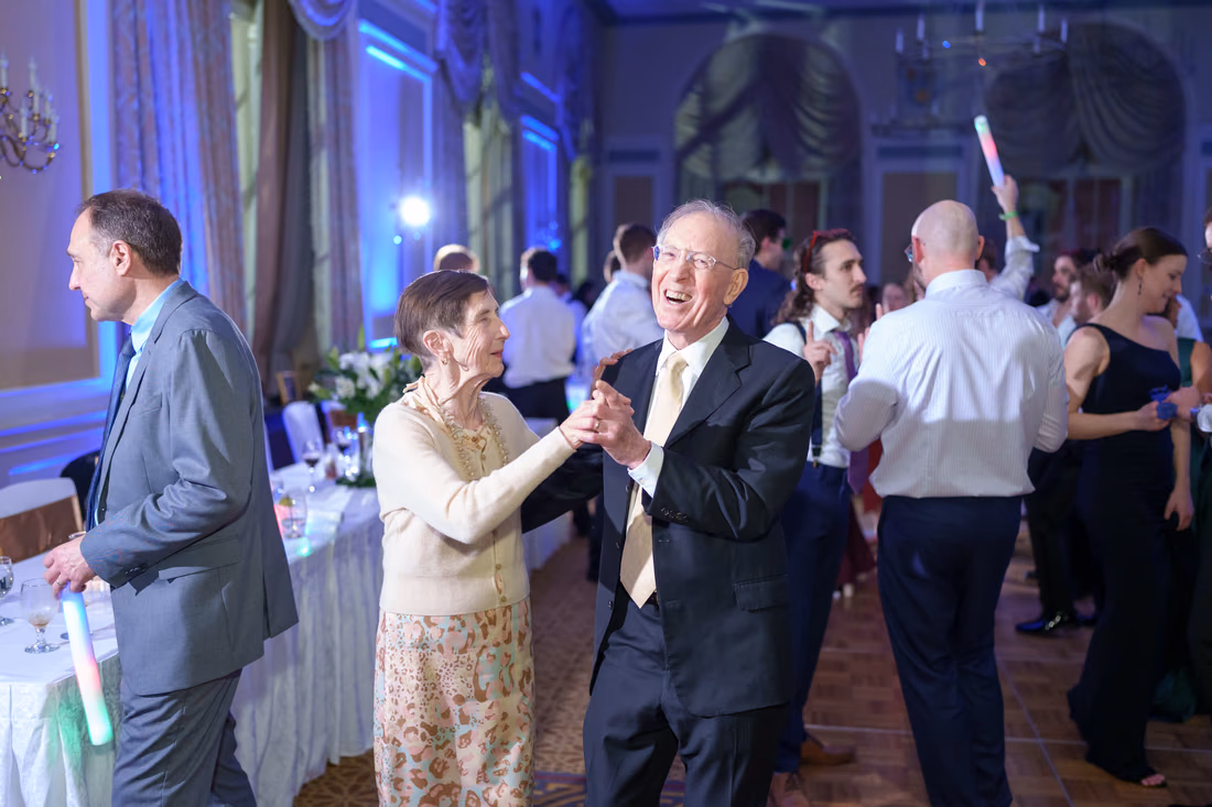 Older couple dancing under the blue lights - Francis Marion Charleston