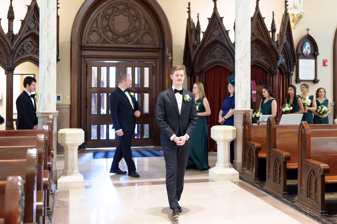 Groom walking down the aisle - Cathedral of Saint John Charleston