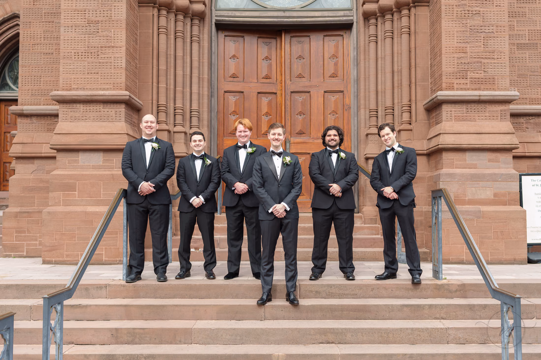Groomsmen lined up on the cathedral steps - Cathedral of Saint John Charleston