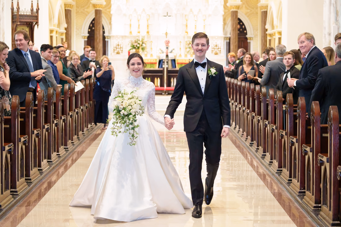 Happy couple after the ceremony - Cathedral of Saint John Charleston