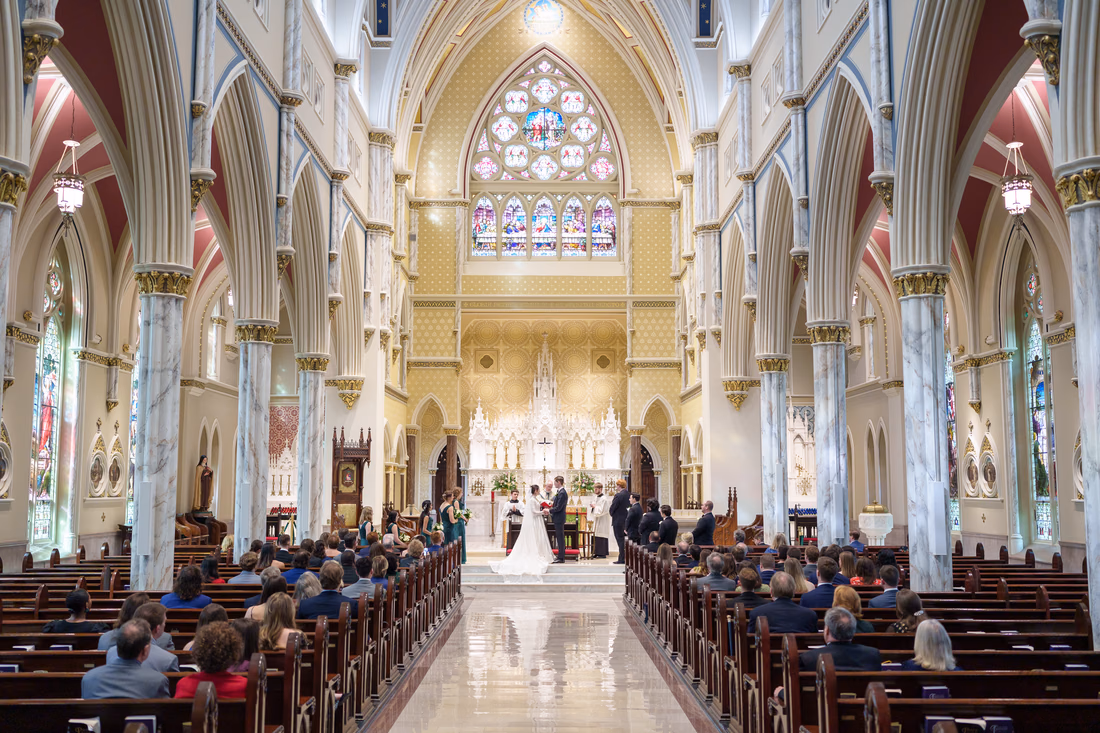 Wide view of the ceremony from the back of the cathedral - Cathedral of Saint John Charleston