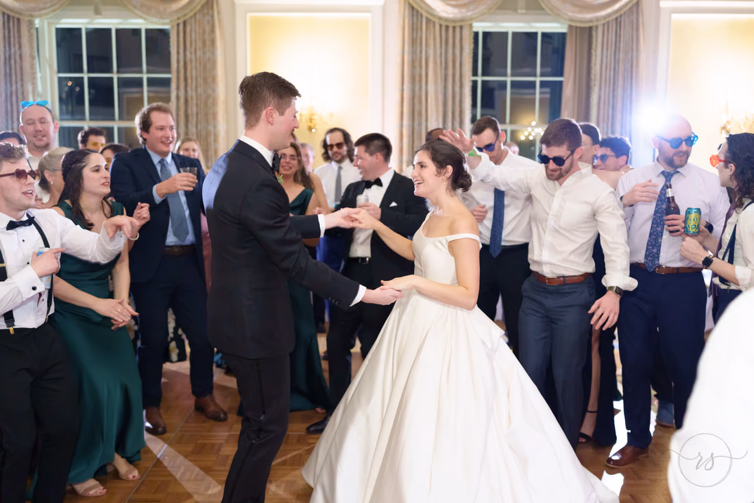 Bride and groom dancing in the middle of the crowd - Francis Marion Charleston