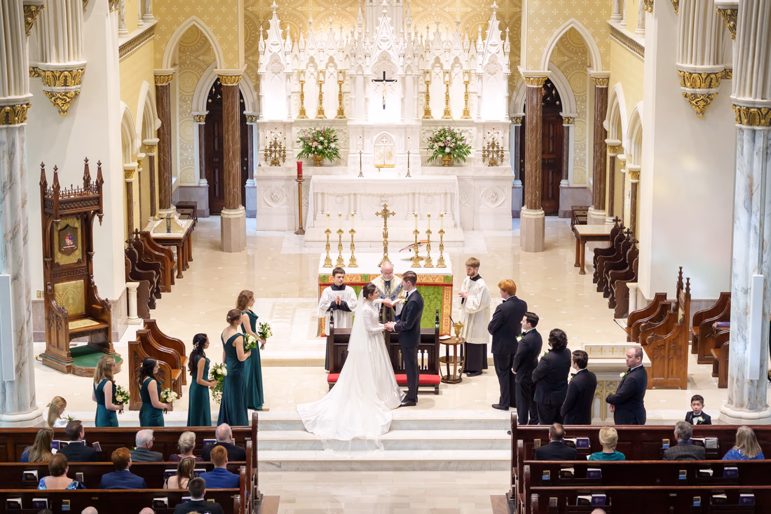 Wedding party at the altar seen from the balcony - Cathedral of Saint John Charleston