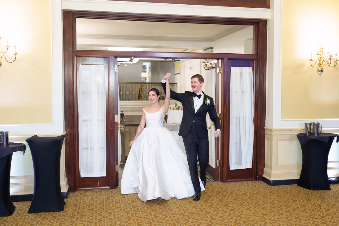 Bride and groom making their grand entrance - Francis Marion Charleston