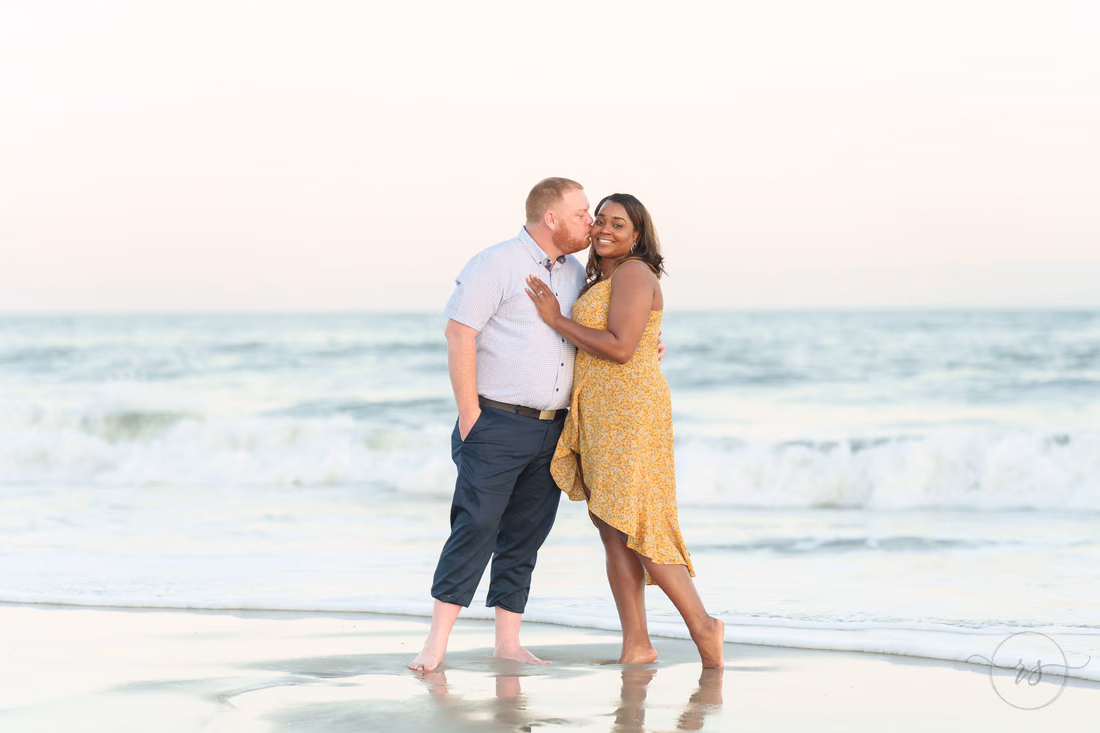 He kisses her cheek by the waves - Huntington Beach State Park