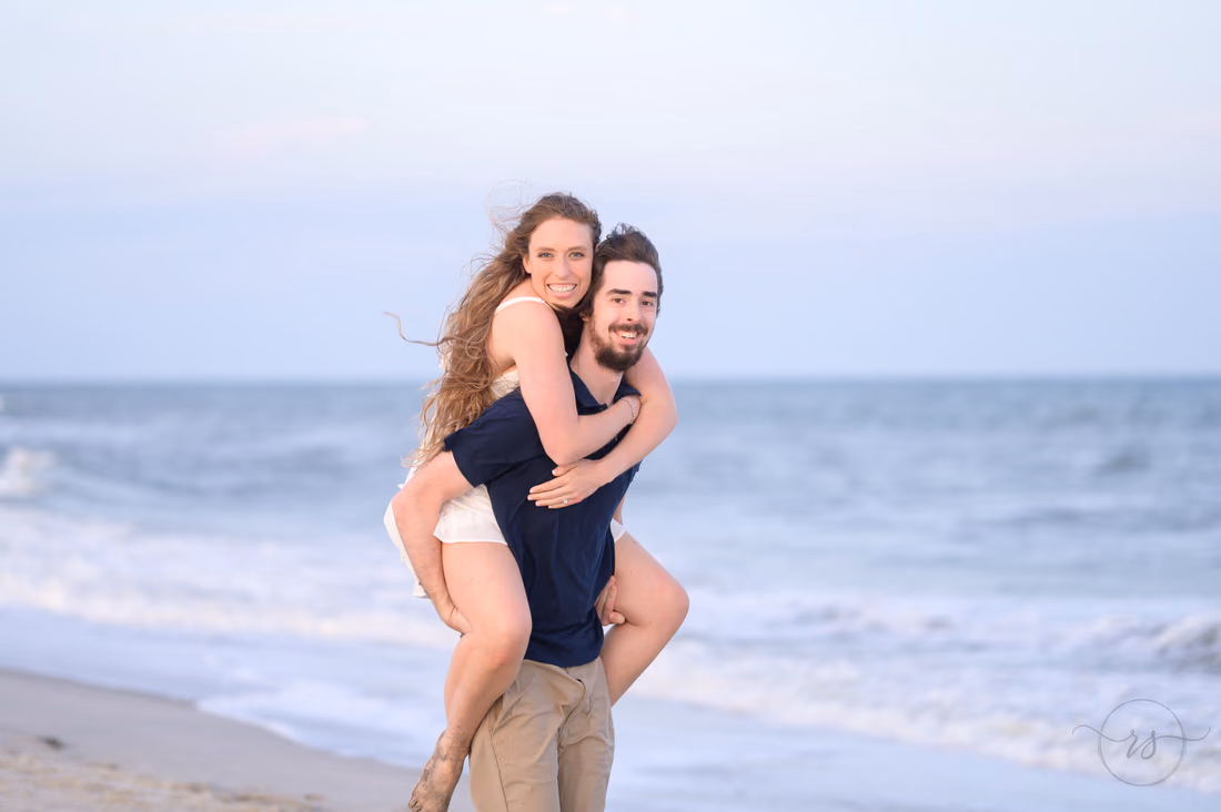 Piggyback ride by the ocean - Huntington Beach State Park