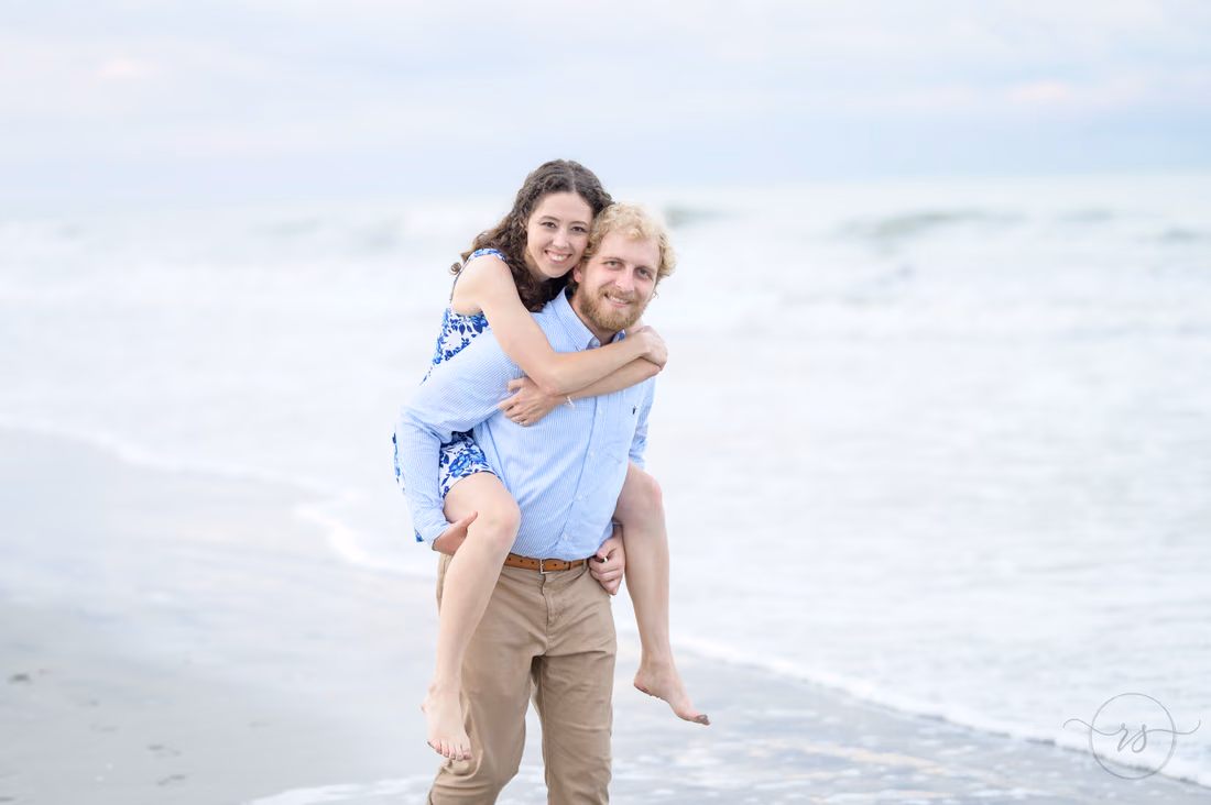 Piggyback ride along the shoreline - Huntington Beach State Park