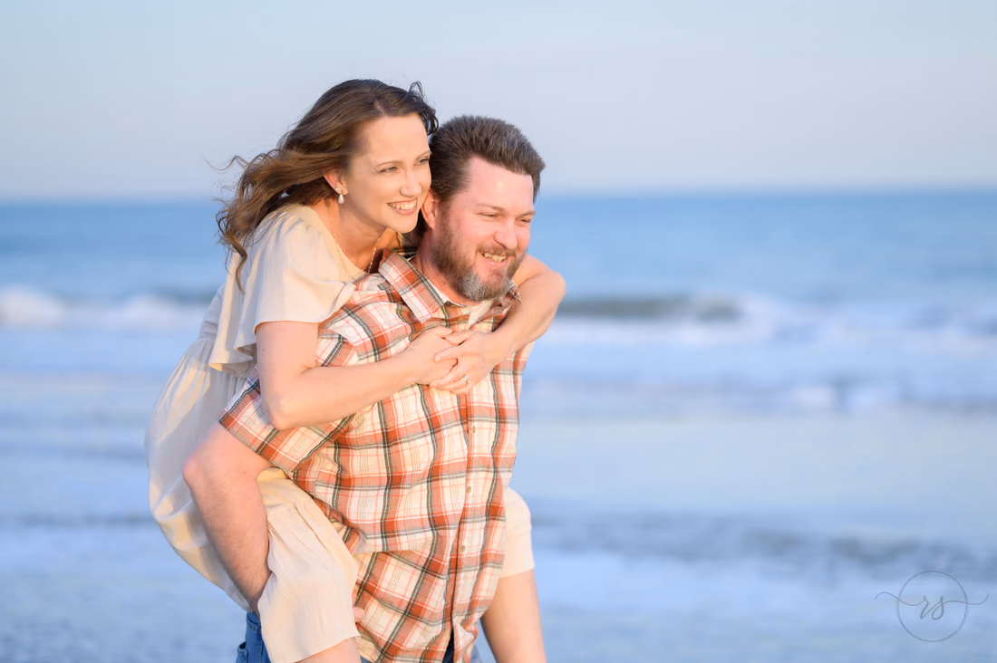 Piggyback ride by the waves - Huntington Beach State Park