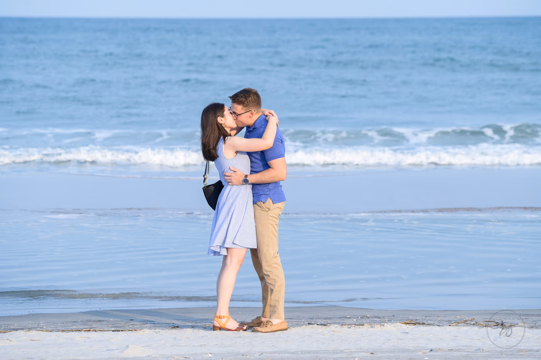 Summer surprise proposal with a beautiful sunset by the ocean - Huntington Beach State Park