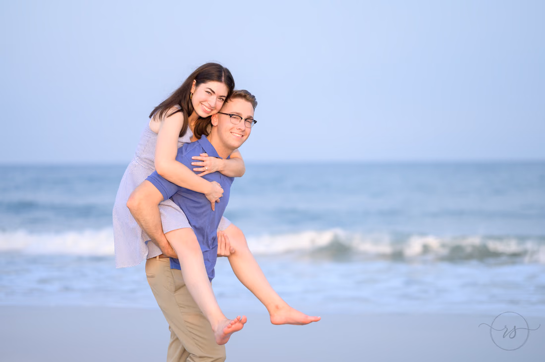 Piggyback ride by the waves after the proposal - Huntington Beach State Park