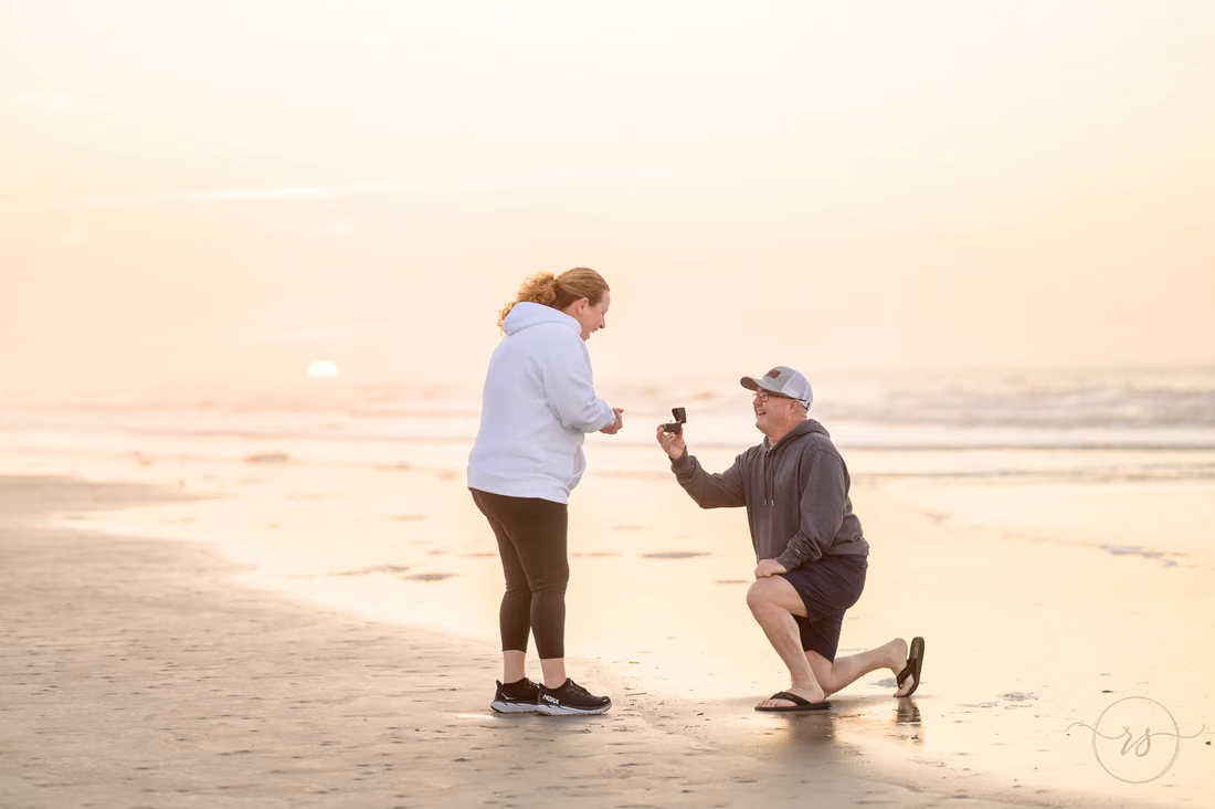 Surprise proposal at sunrise - Sunset Beach
