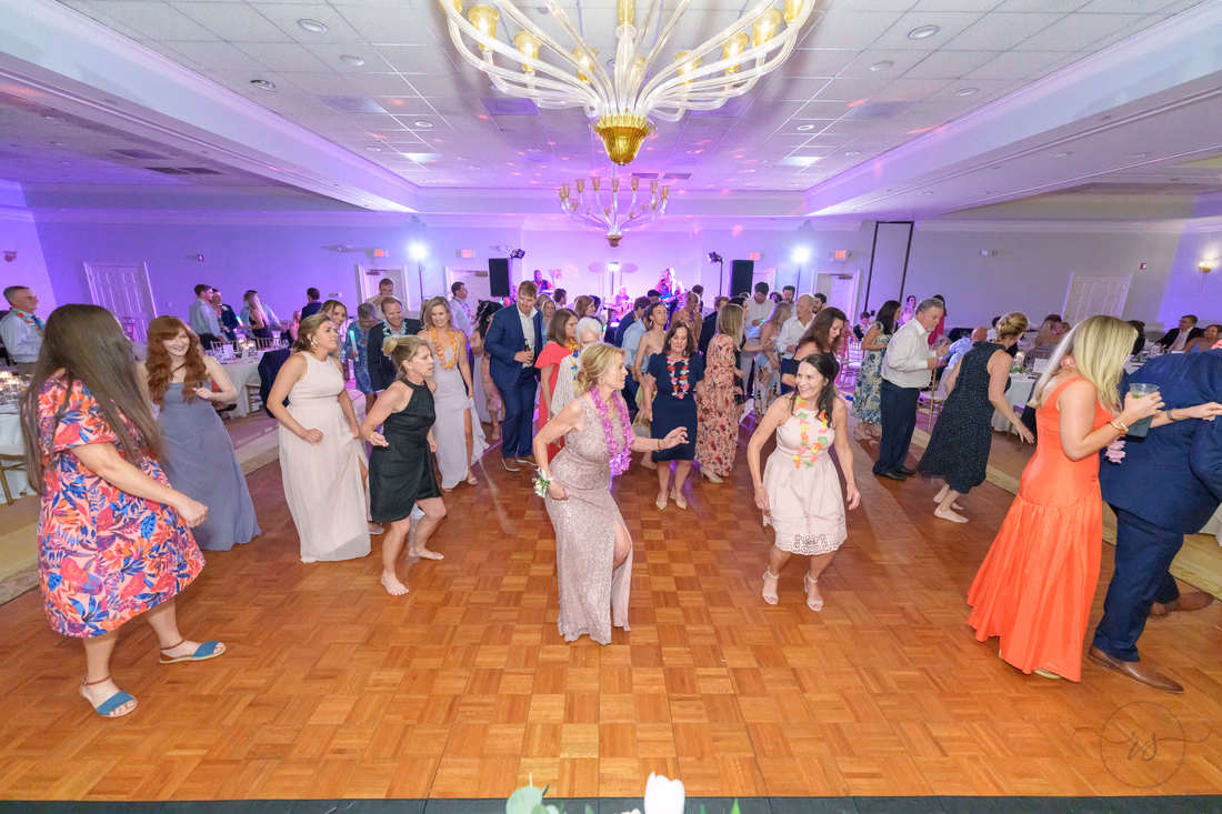Guests line dance across the parquet floor at Pawleys Plantation