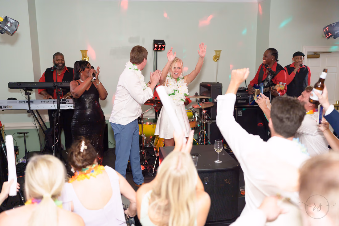 Bride and groom on the stage - Pawleys Plantation