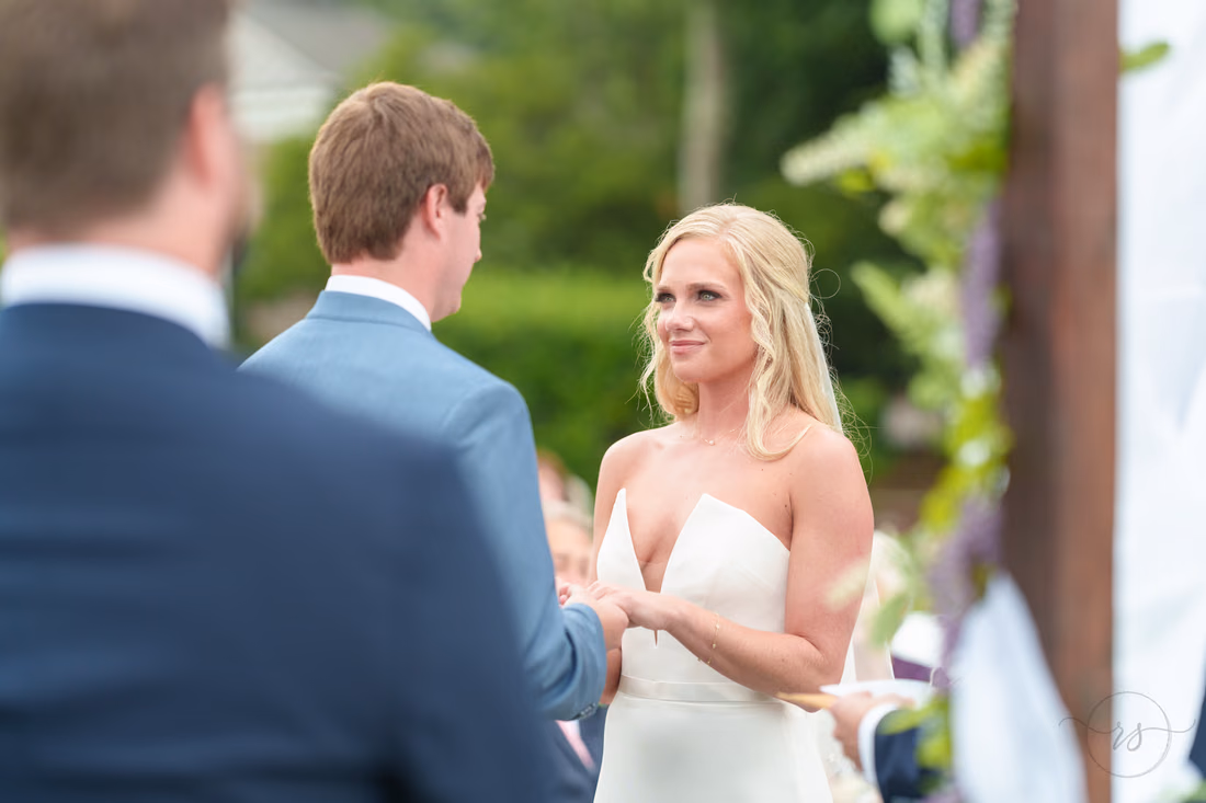 Bride looking at groom during vows - Pawleys Plantation