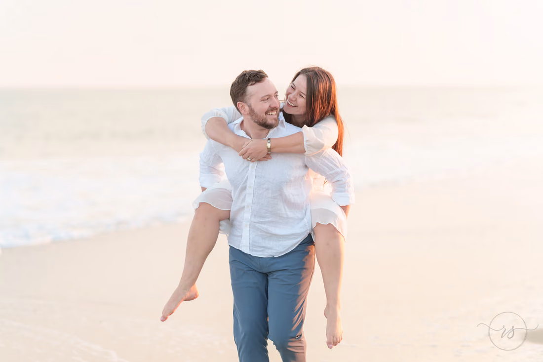 Piggyback ride on the beach - Huntington Beach State Park