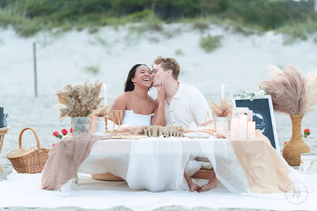 Kiss on the cheek at the picnic table - Myrtle Beach