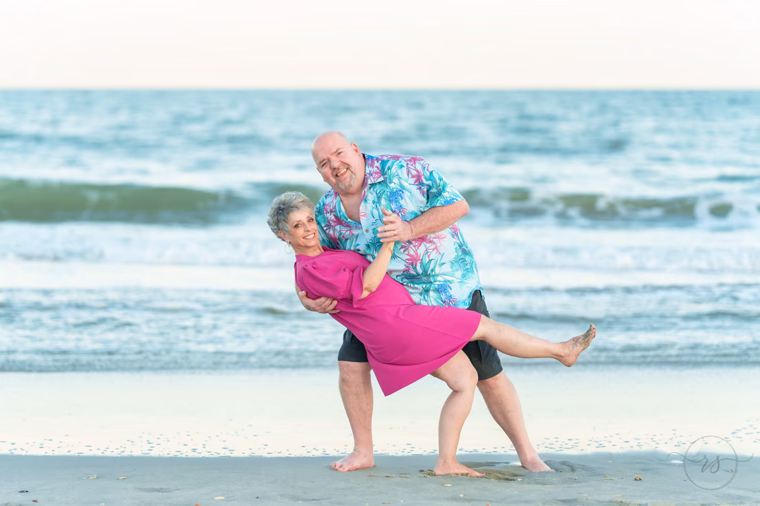 He dips her by the ocean - Huntington Beach State Park