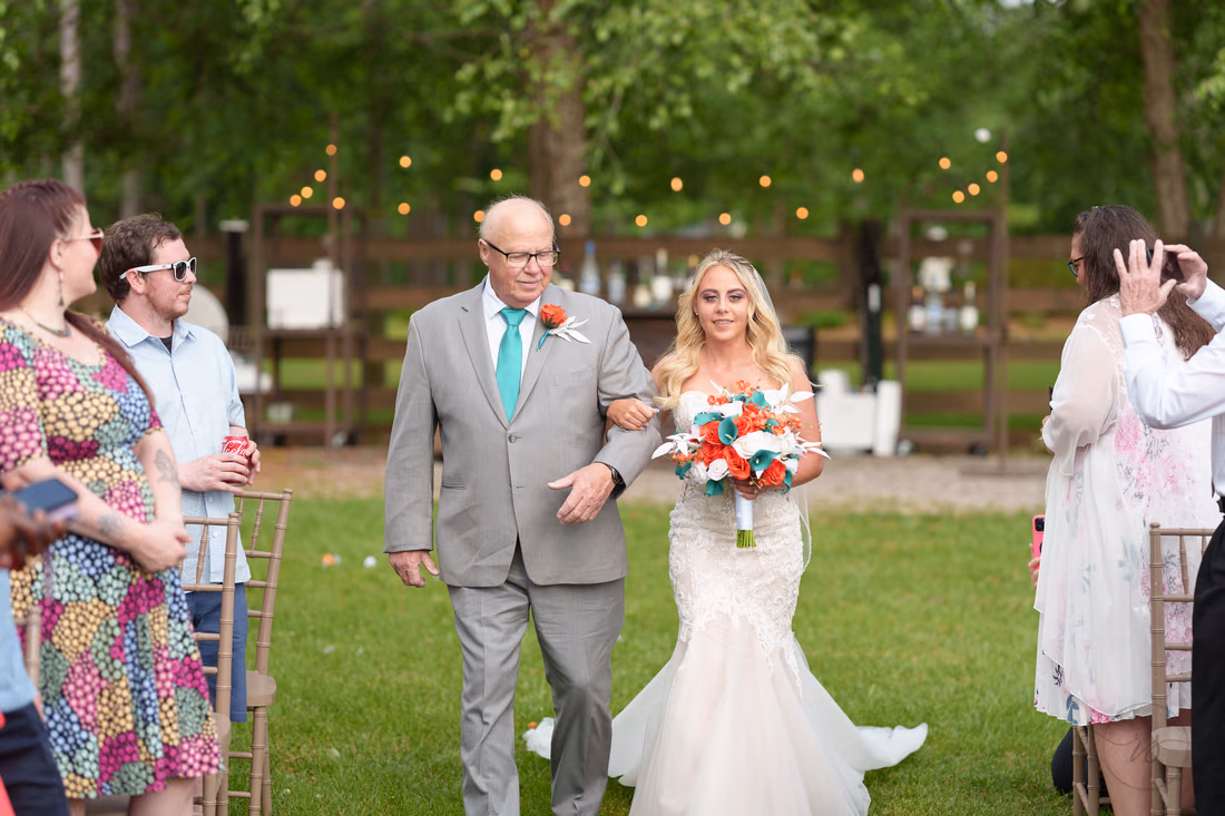 Bride walking down the aisle with her father - Wildhorse at Parker Farms