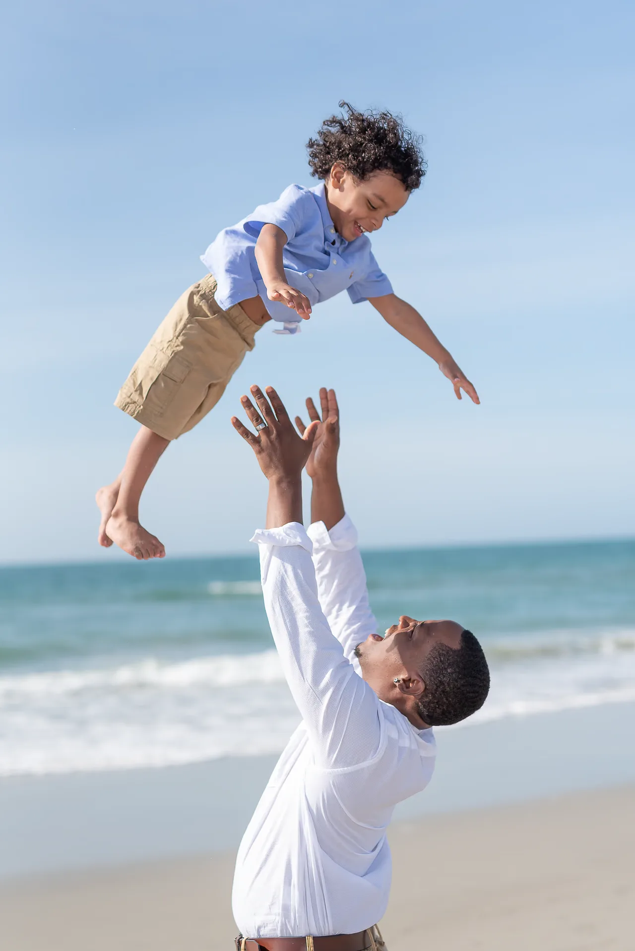 Having fun with dad on a sunny morning -