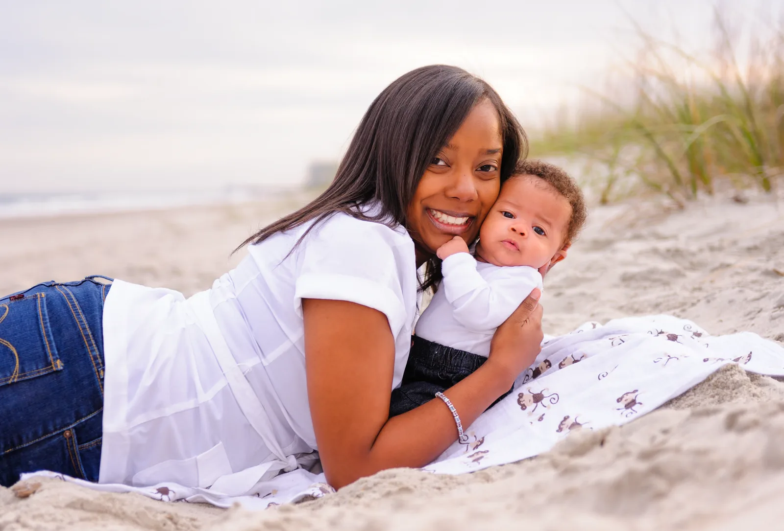 Mom and baby laying by the dunes - Myrtle Beach State Park