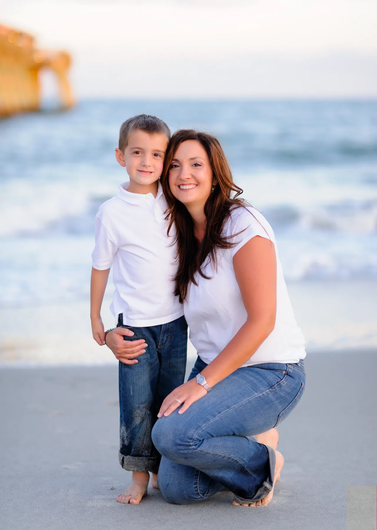 Mother and son in front of the ocean - Myrtle Beach State Park Pier