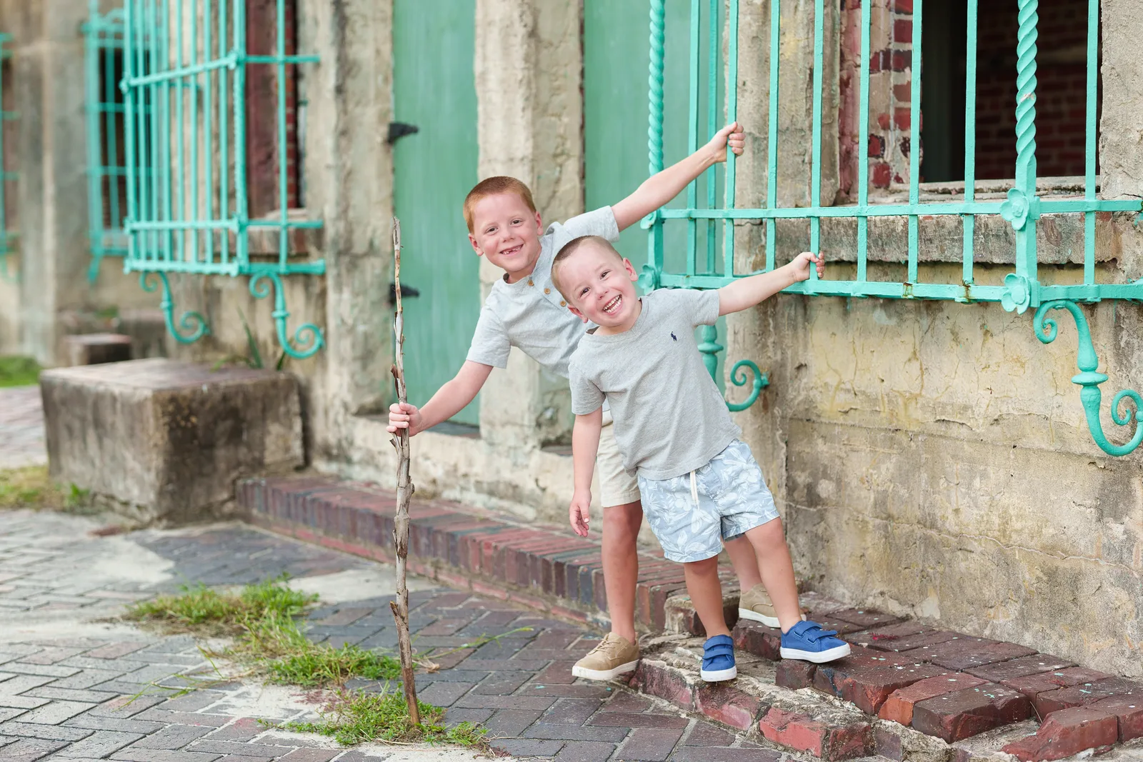 Little brothers with big smiles hanging from the window - Huntington Beach State Park - Pawleys Island