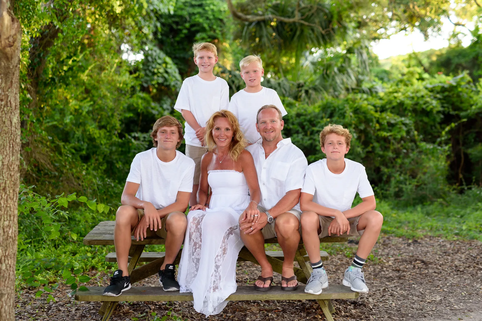 Mom with all her guys on a picnic table - Myrtle Beach State Park