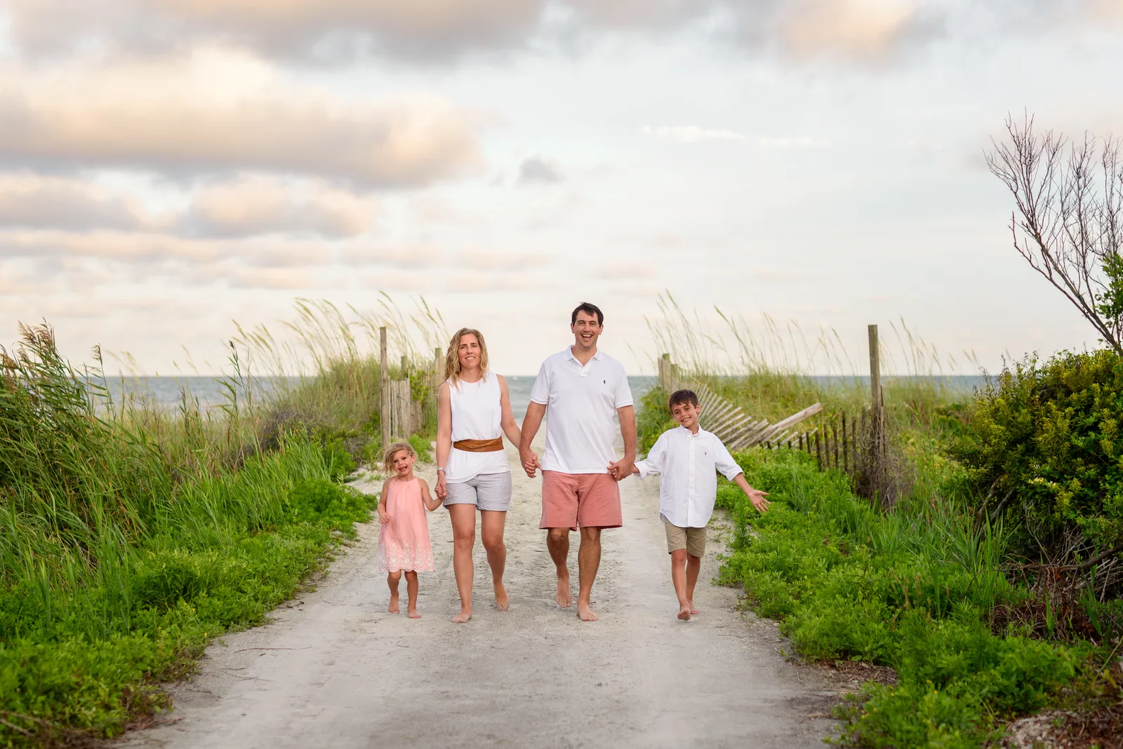 Family walking from the ocean on a windy evening - Myrtle Beach