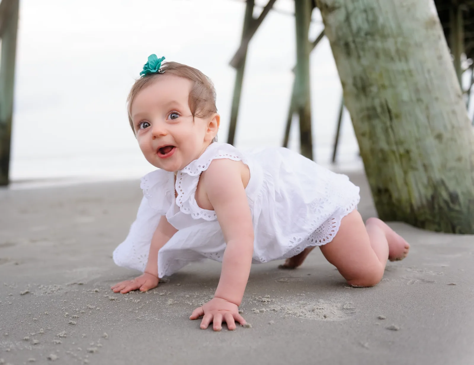 Baby girl crawling on the beach - Myrtle Beach State Park