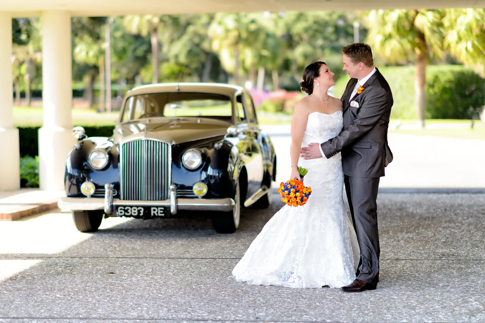 Couple standing by a classic car - Dunes Club - Myrtle Beach