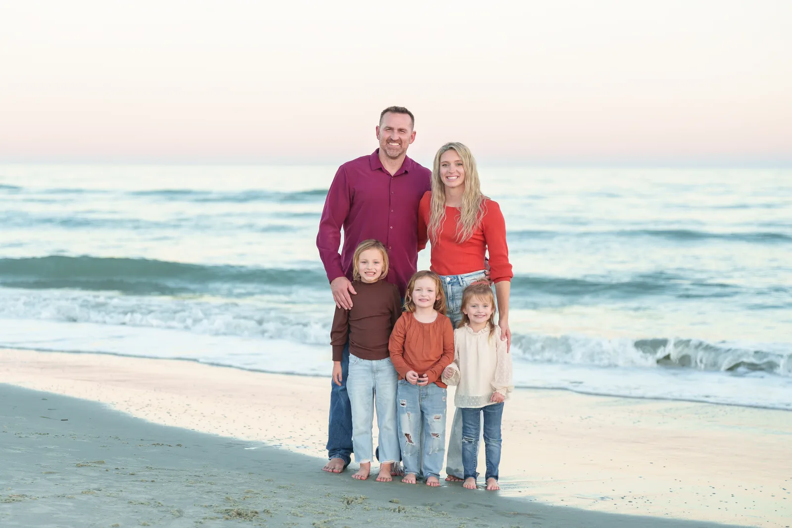 Family of 5 on a winter day by the ocean - Huntington Beach State Park