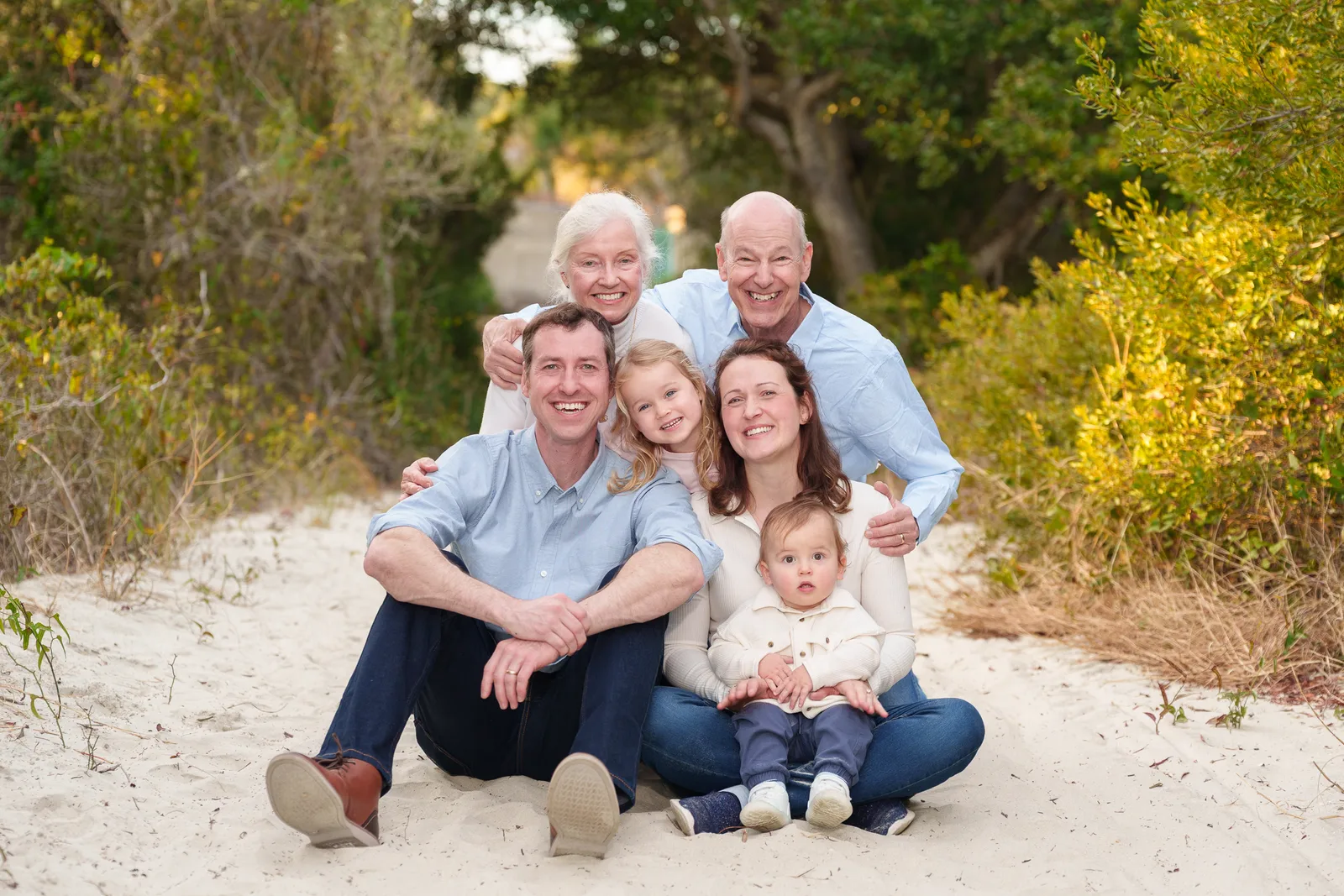 Happy family doing winter portraits on the beach - Huntington Beach State Park