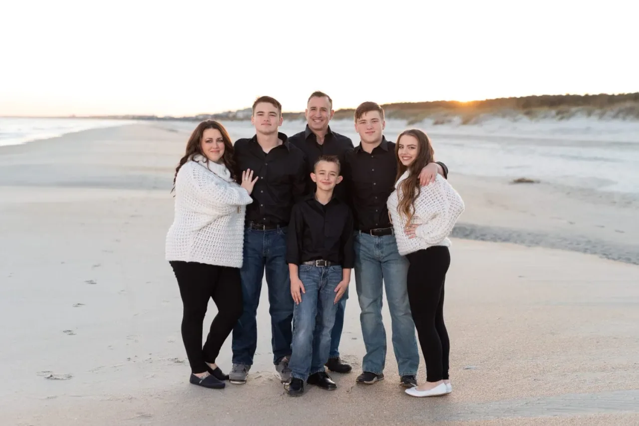 Family of 6 in the winter sunset - Huntington Beach State Park