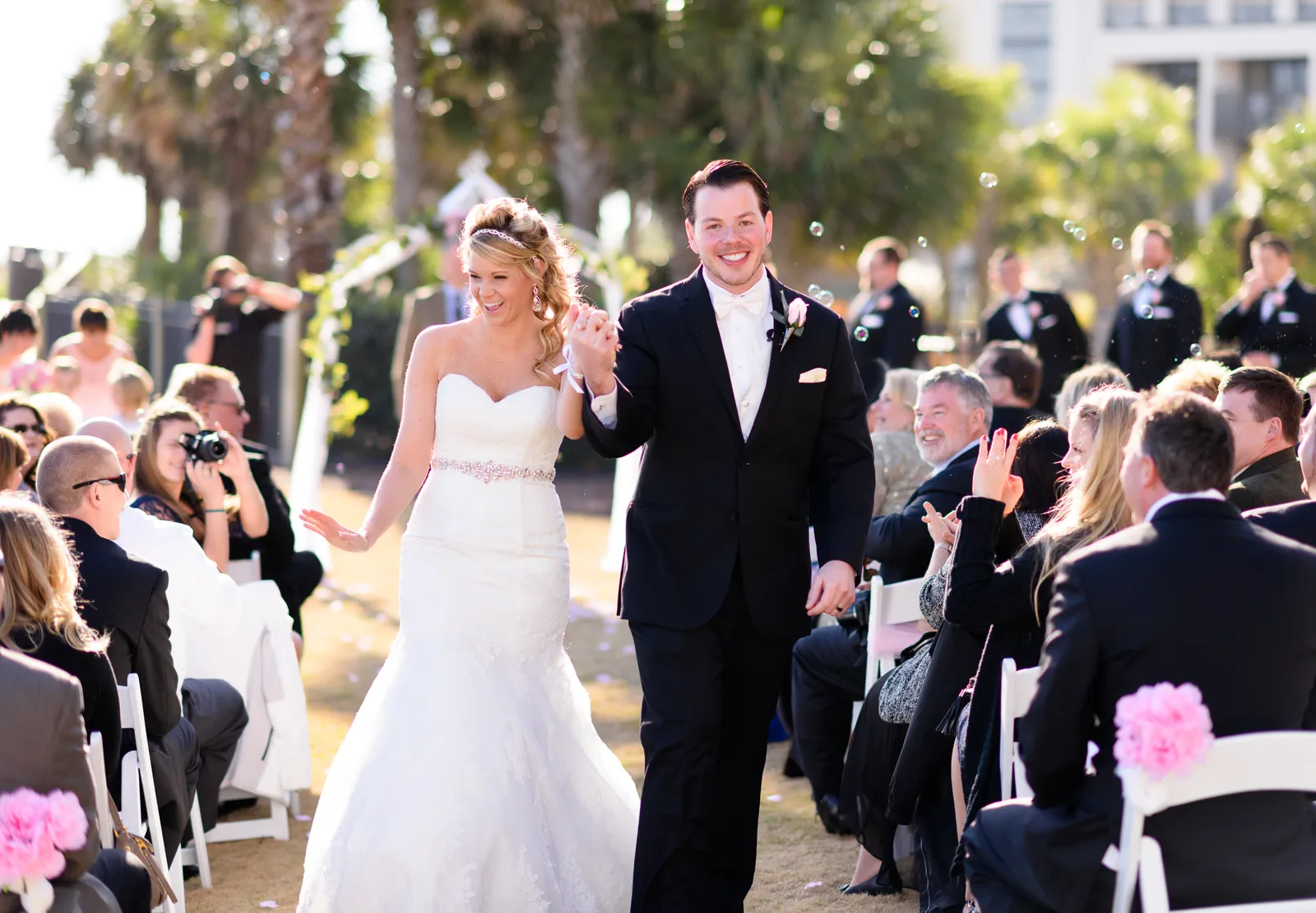 Happy couple walking down isle after ceremon - Springmaid Beach, Myrtle Beach