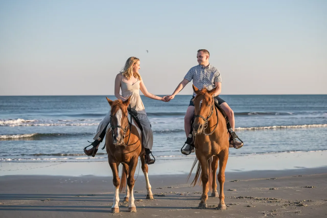 Holding hands on horseback - Inlet Point Plantation - Little River
