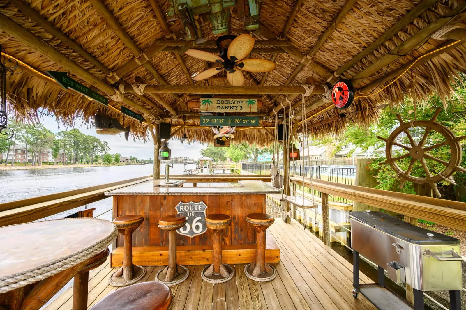 Tiki bar with stools on a home dock on the Intracoastal Waterway in Myrtle Beach