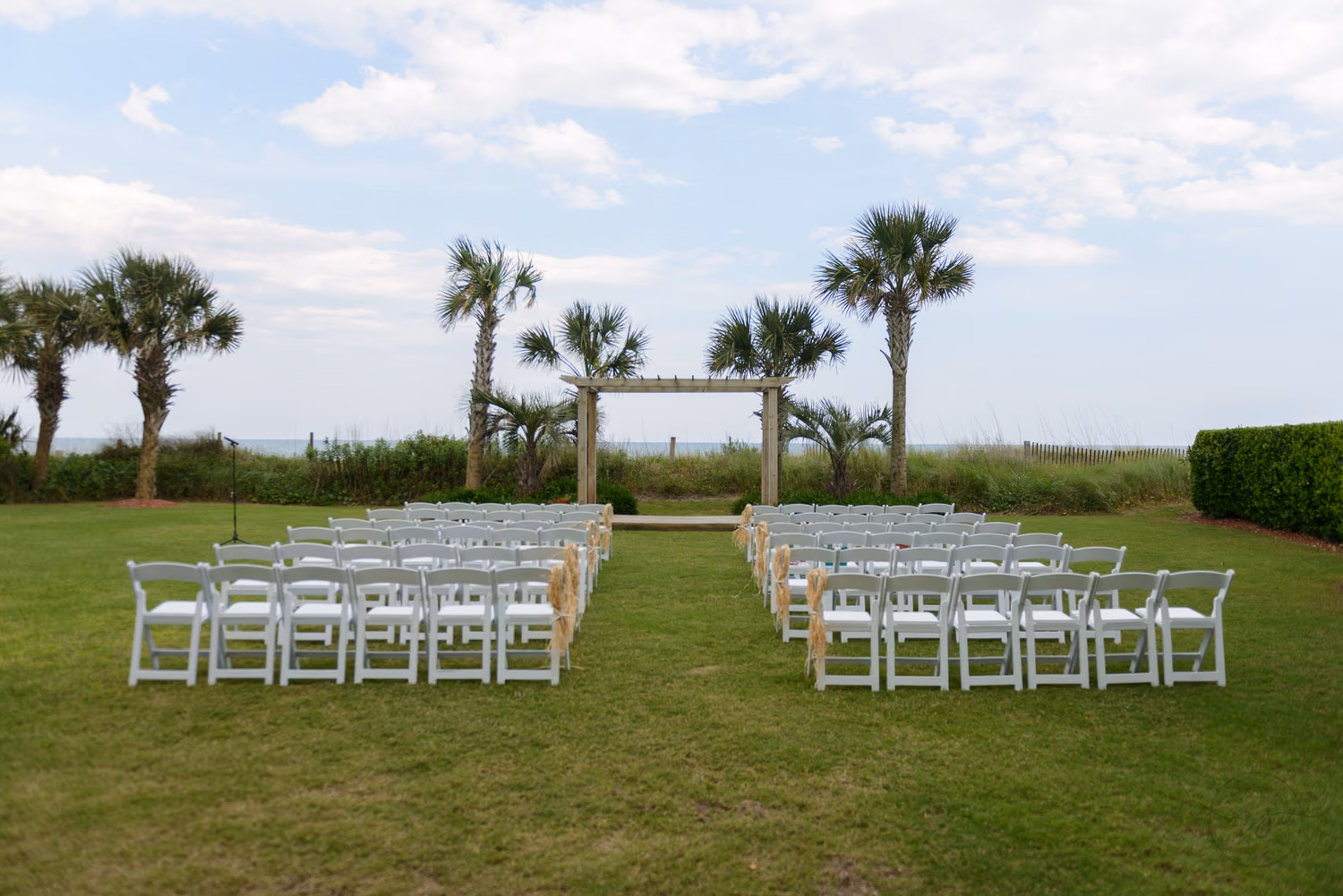 Wedding location on the grass behind the Hilton Myrtle Beach Resort at Kingston Resorts