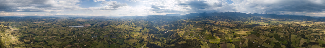 Drone panorama of patchwork mountain farmland in Boyaca, Colombia