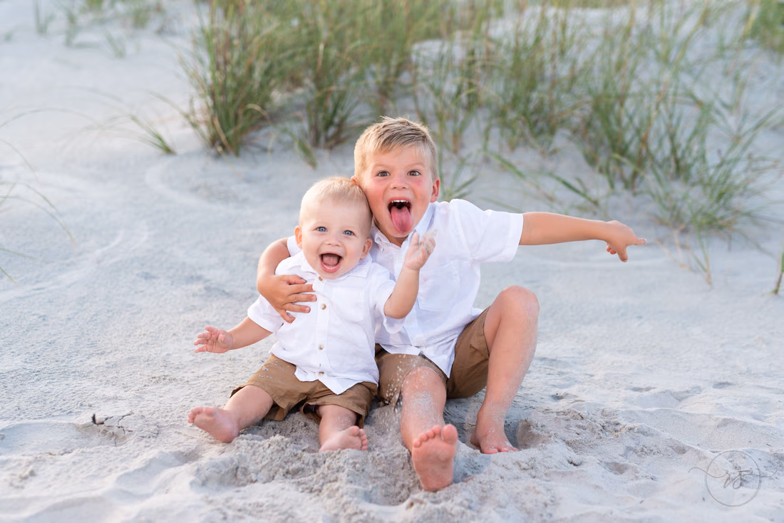 Brothers having fun in the sand - Huntington Beach State Park