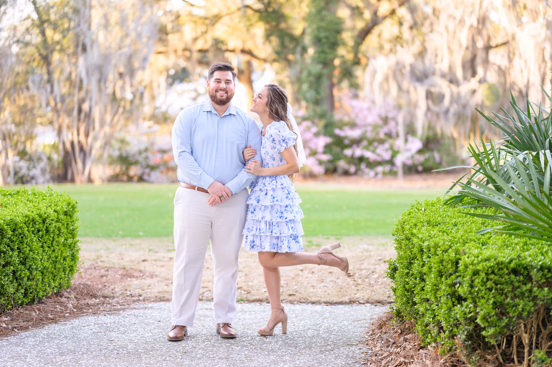 Beautiful background of flowers and oaks for happy couple - Caledonia Golf and Fish Club
