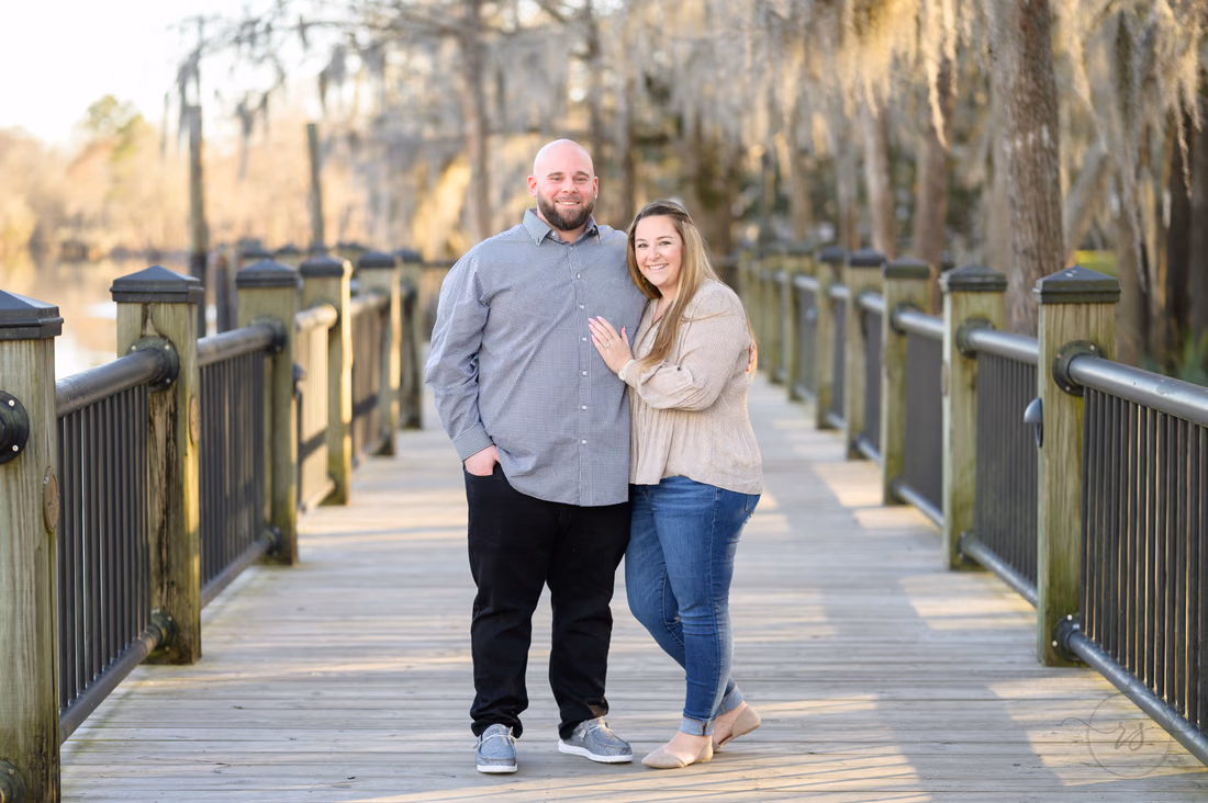 Happy couple after a surprise January proposal - Conway Riverwalk