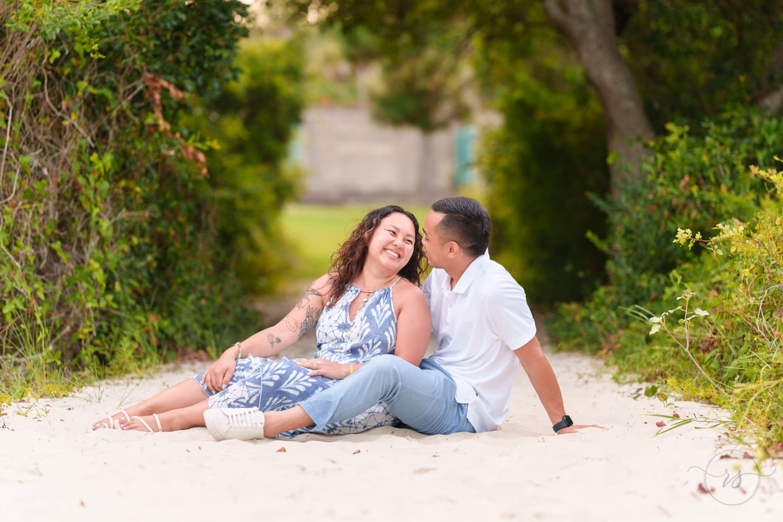 Happy couple on the beach path after the proposal - Huntington Beach State Park